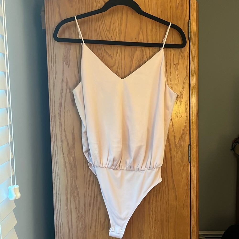Express Champagne Pink bodysuit size small. NWOT!
